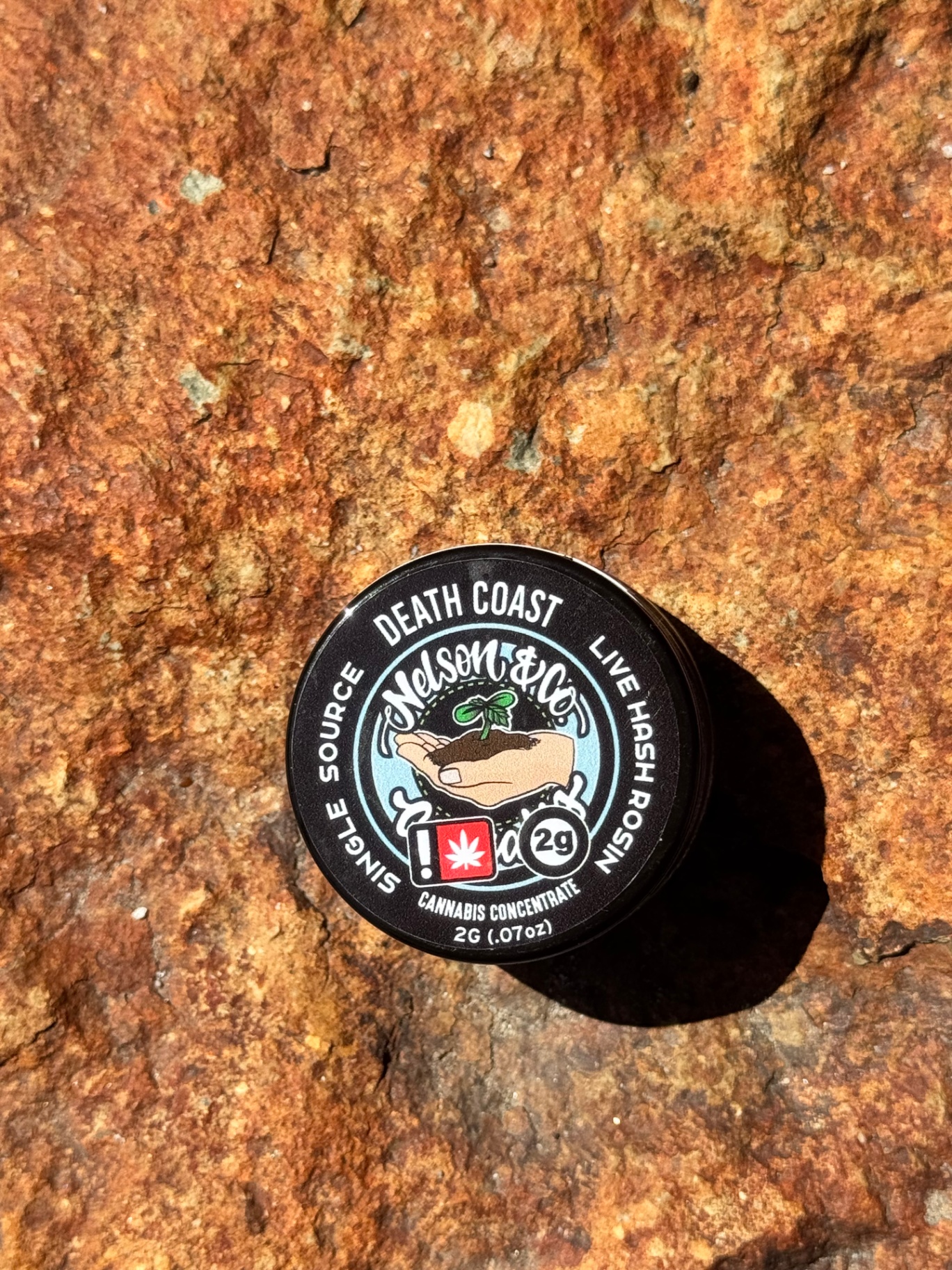 Nelson & CO Death Coast 2g live hash rosin jar on stone